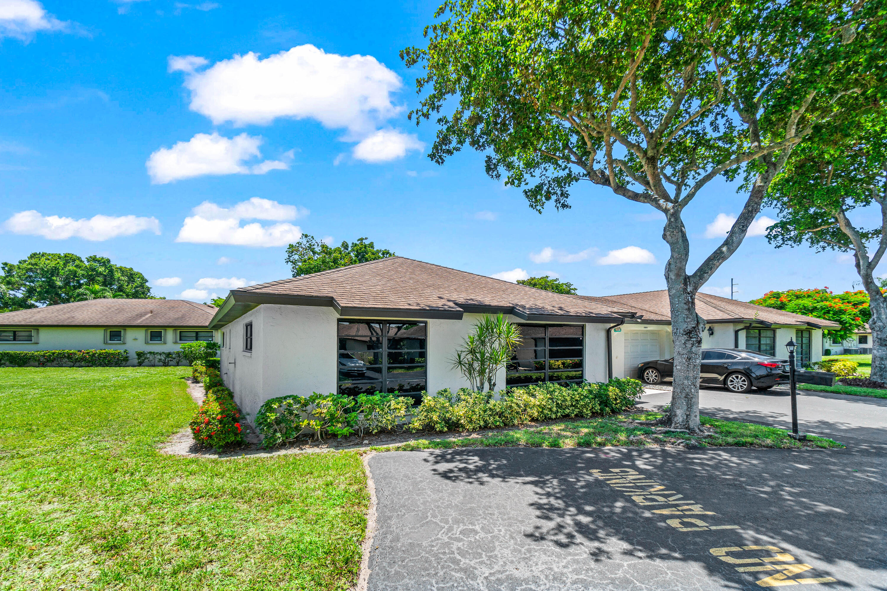4897 Hawkwood Road, Unit A Boynton Beach, FL 33436 - Photo 1 of 25 Front of Villa