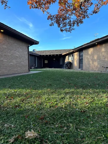 a view of a yard with an outdoor space