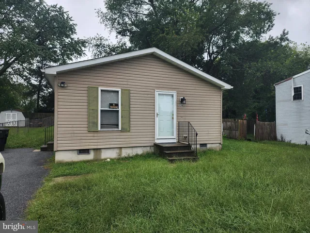 a view of a backyard with a garden