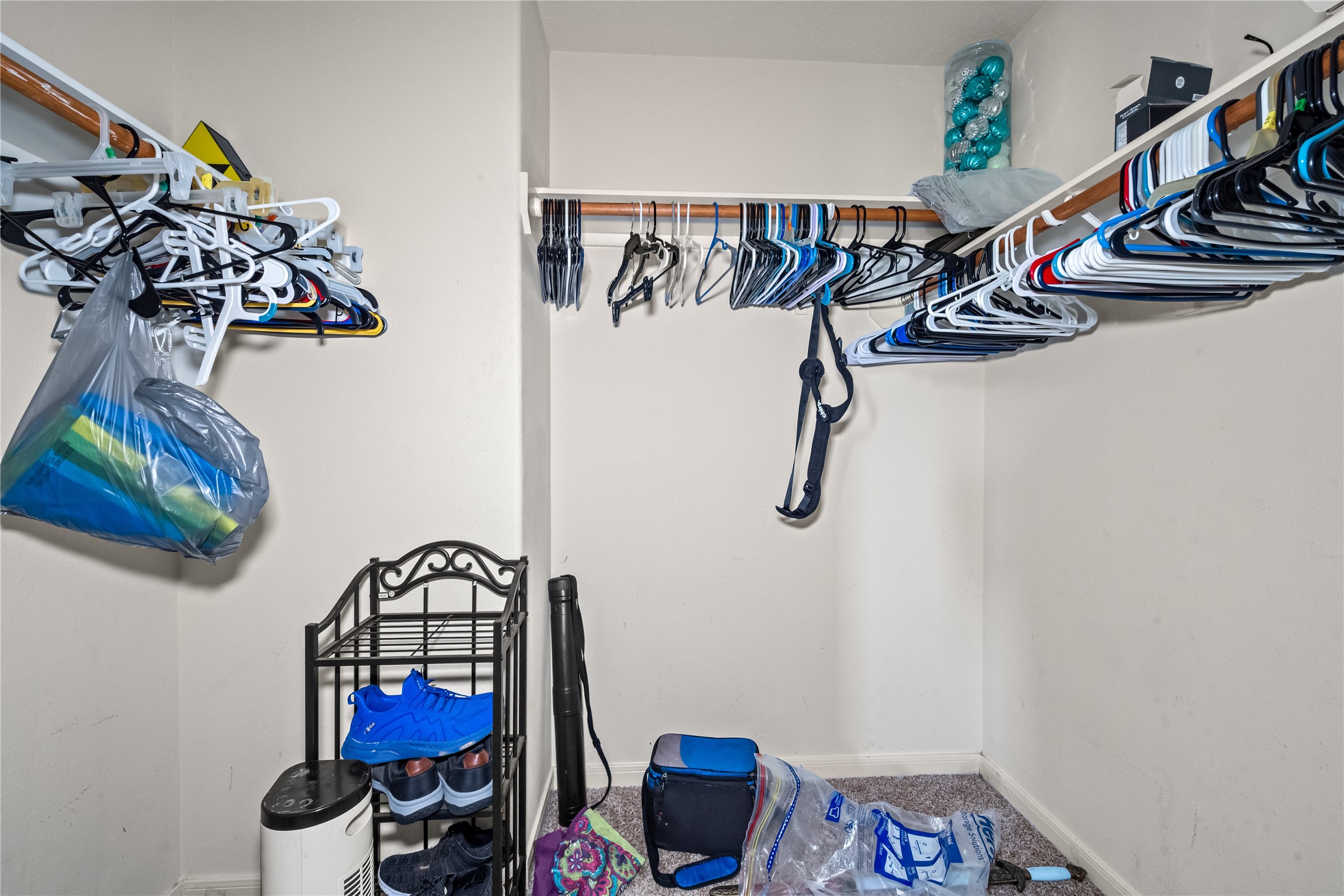 28832 San Bernard River Loop Spring, TX 77386 - Photo 45 of 50 a view of walk in closet with clothes and shoes
