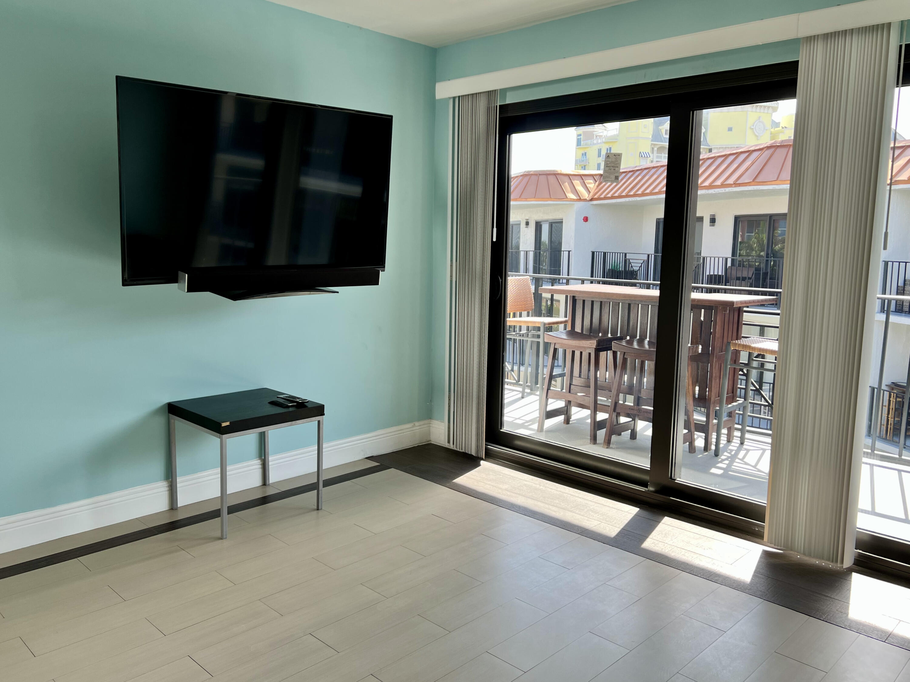 2029 North Ocean Boulevard, Unit 510 Fort Lauderdale, FL 33305 - Photo 14 of 39 a view of an empty room with glass door and a window