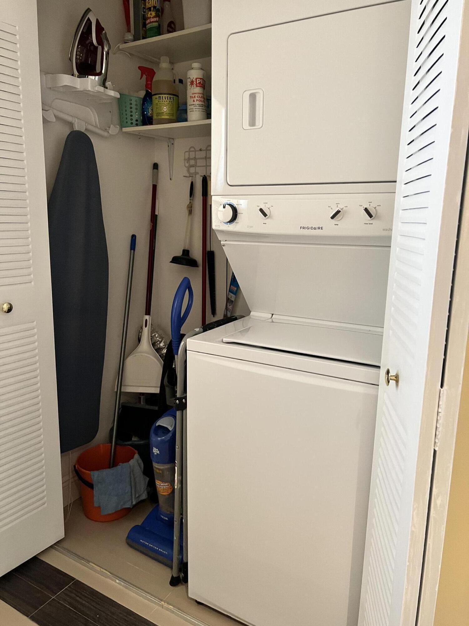 2029 North Ocean Boulevard, Unit 510 Fort Lauderdale, FL 33305 - Photo 24 of 39 a utility room with dryer and washer