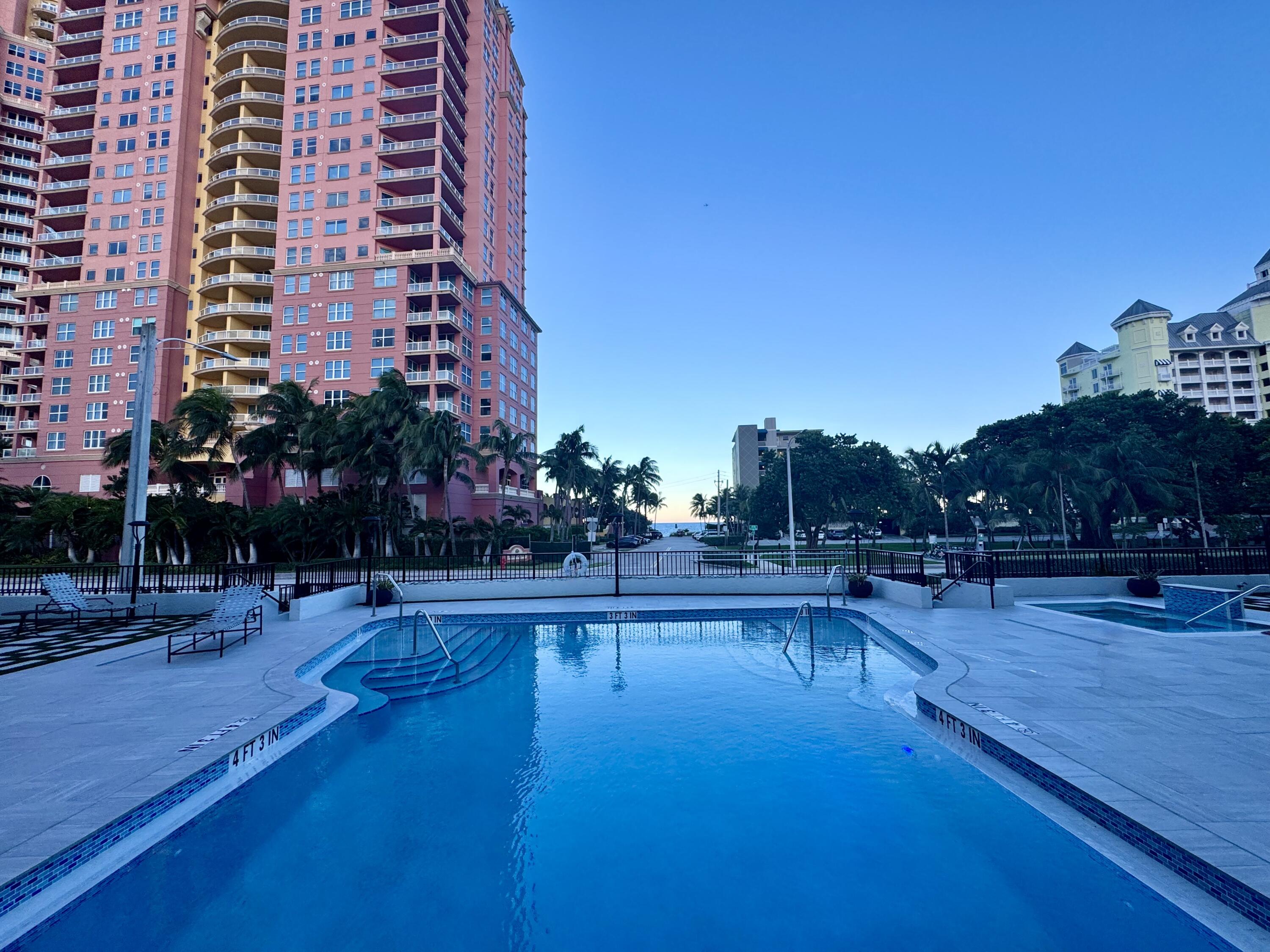 2029 North Ocean Boulevard, Unit 510 Fort Lauderdale, FL 33305 - Photo 27 of 39 a view of a swimming pool with outdoor seating and plants
