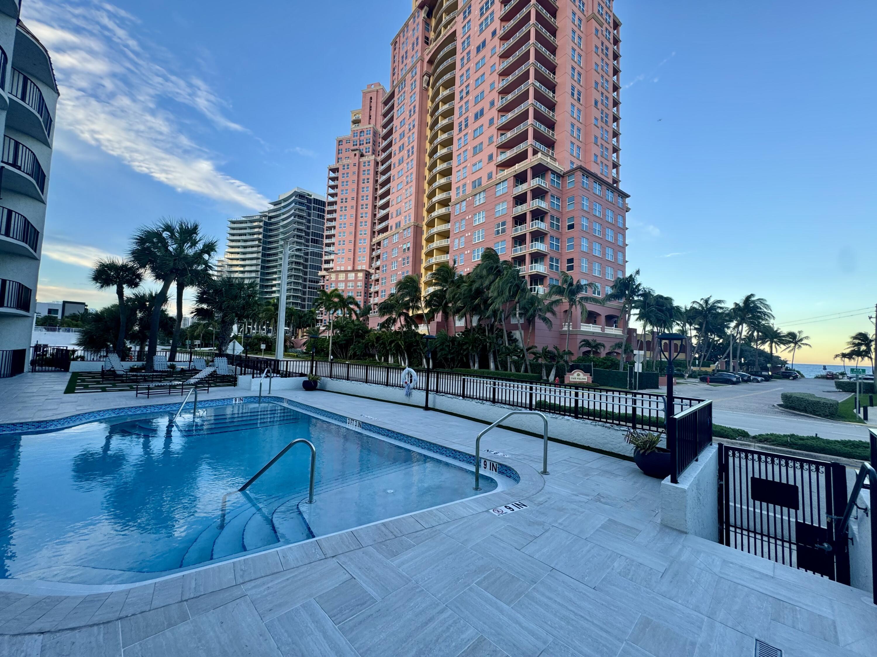 2029 North Ocean Boulevard, Unit 510 Fort Lauderdale, FL 33305 - Photo 31 of 39 a view of a swimming pool with outdoor seating and plants