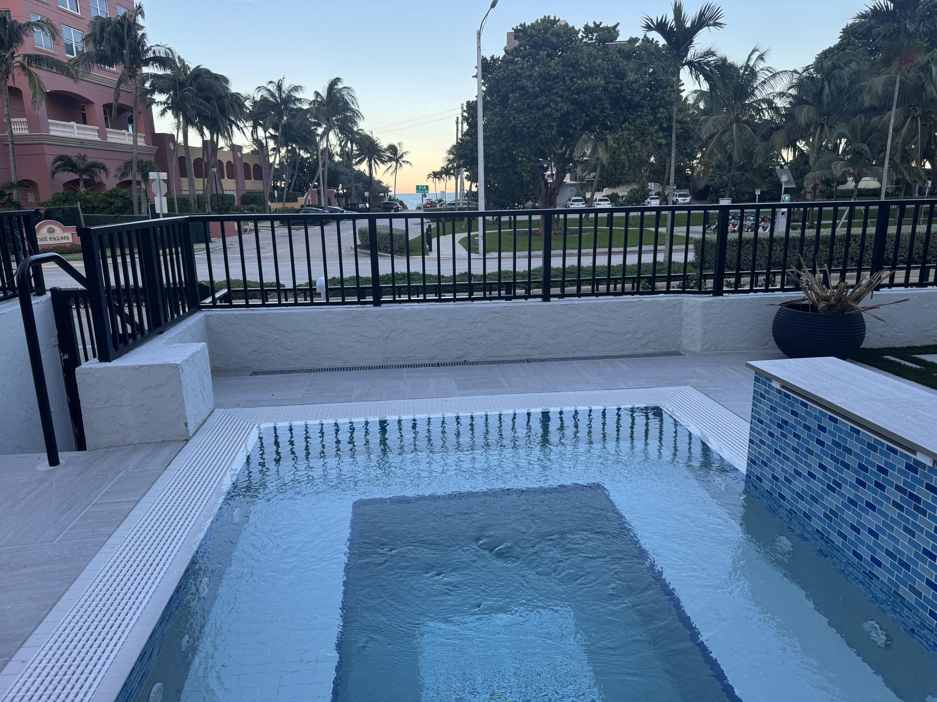 2029 North Ocean Boulevard, Unit 510 Fort Lauderdale, FL 33305 - Photo 34 of 39 a view of a roof deck with wooden floor and outdoor seating
