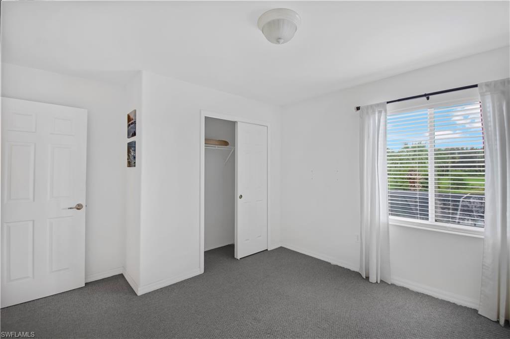 2133 Fairmont Lane Naples, FL 34120 - Photo 14 of 31 a view of an empty room with a window