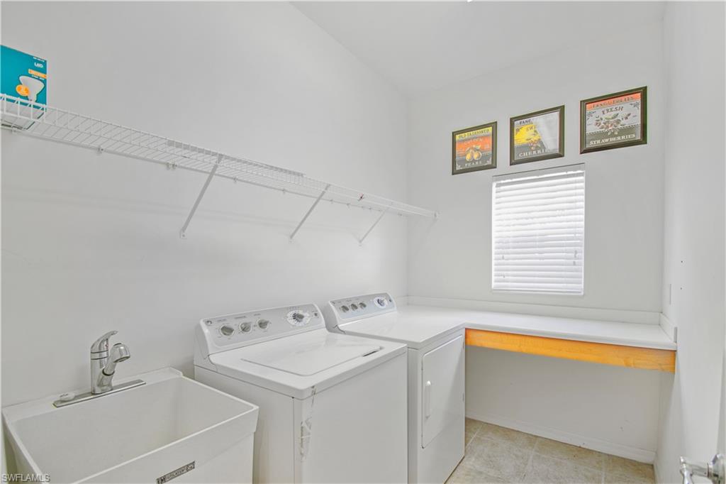 2133 Fairmont Lane Naples, FL 34120 - Photo 19 of 31 a utility room with dryer and washer