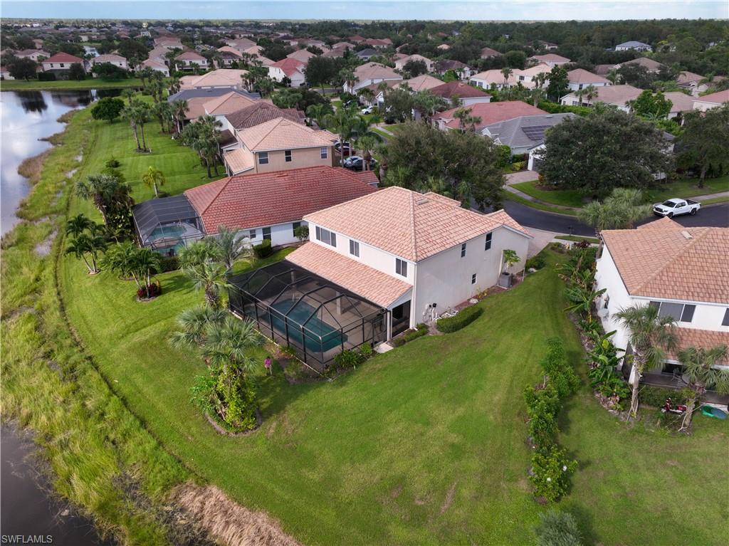 2133 Fairmont Lane Naples, FL 34120 - Photo 23 of 31 an aerial view of residential houses with outdoor space