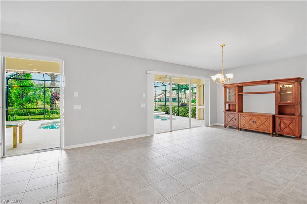 2133 Fairmont Lane Naples, FL 34120 - Photo 8 of 31 a view of an empty room with a window