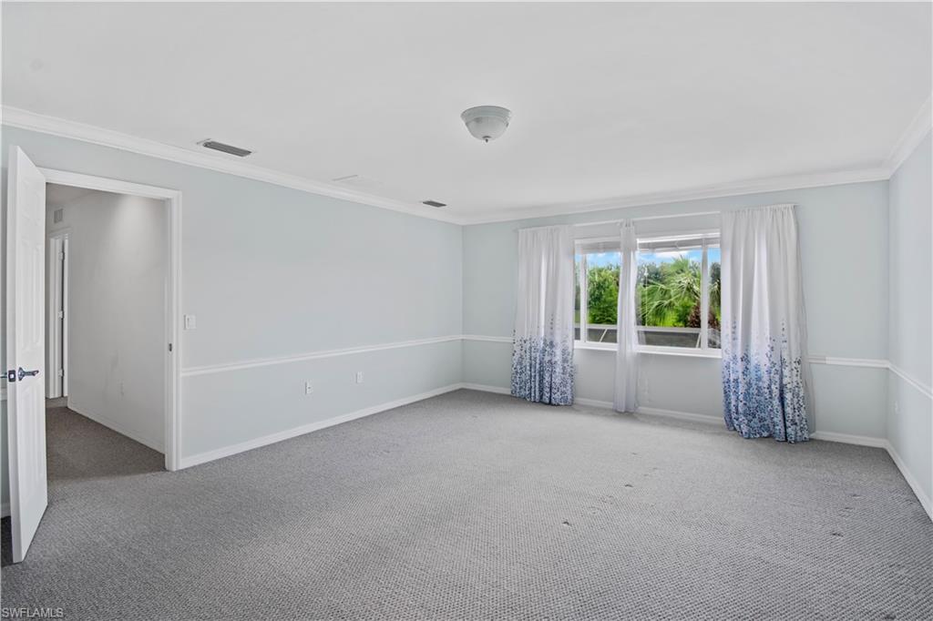 2133 Fairmont Lane Naples, FL 34120 - Photo 10 of 31 a view of an empty room with a window
