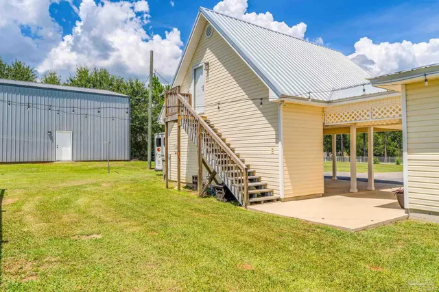 a view of a room with a wooden floor