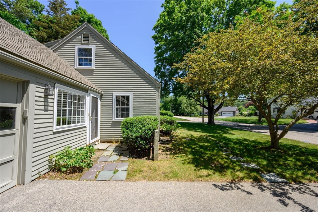 30 Huntley Road Hingham, MA 02043 - Photo 3 of 28 a house view with a garden space