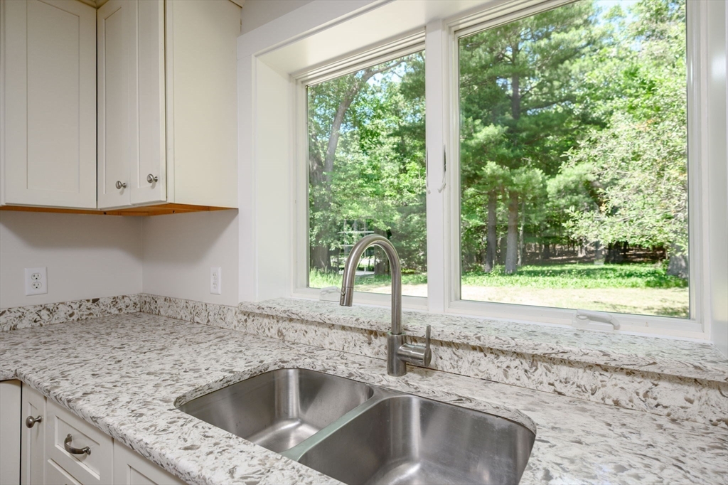 30 Huntley Road Hingham, MA 02043 - Photo 8 of 28 a kitchen with a sink and a window