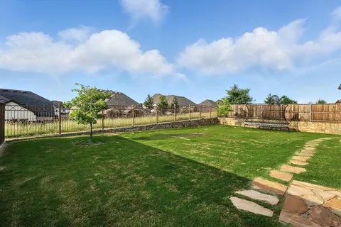 a view of a golf course with a garden