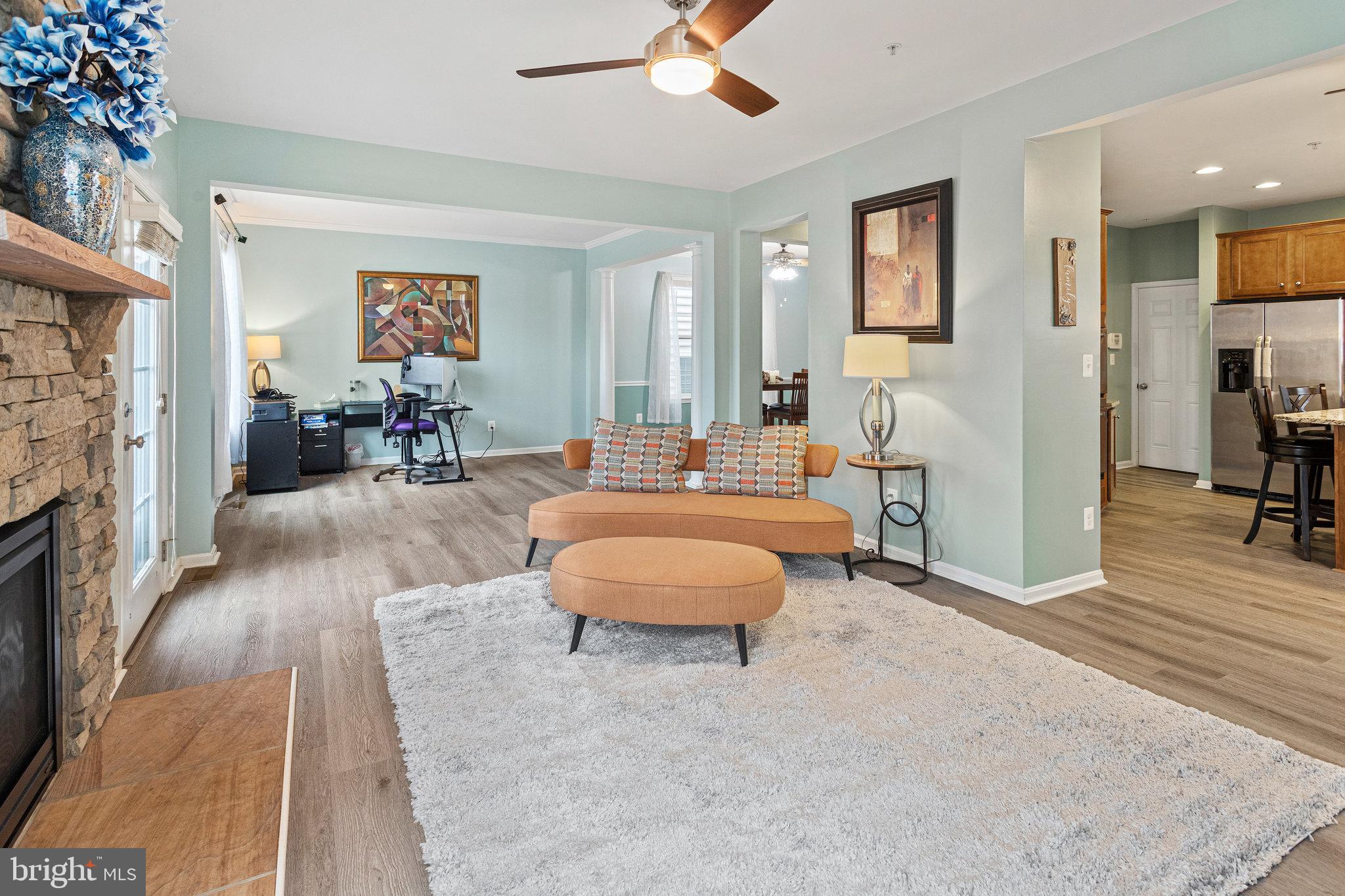 3445 Eagle Ridge Drive Woodbridge, VA 22191 - Photo 11 of 39 a living room with furniture and a fireplace