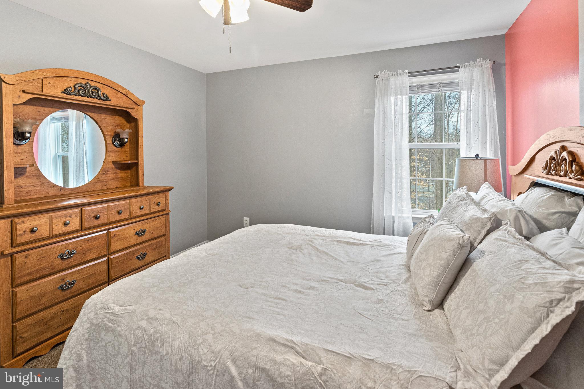3445 Eagle Ridge Drive Woodbridge, VA 22191 - Photo 23 of 39 a bedroom with a bed and a dresser