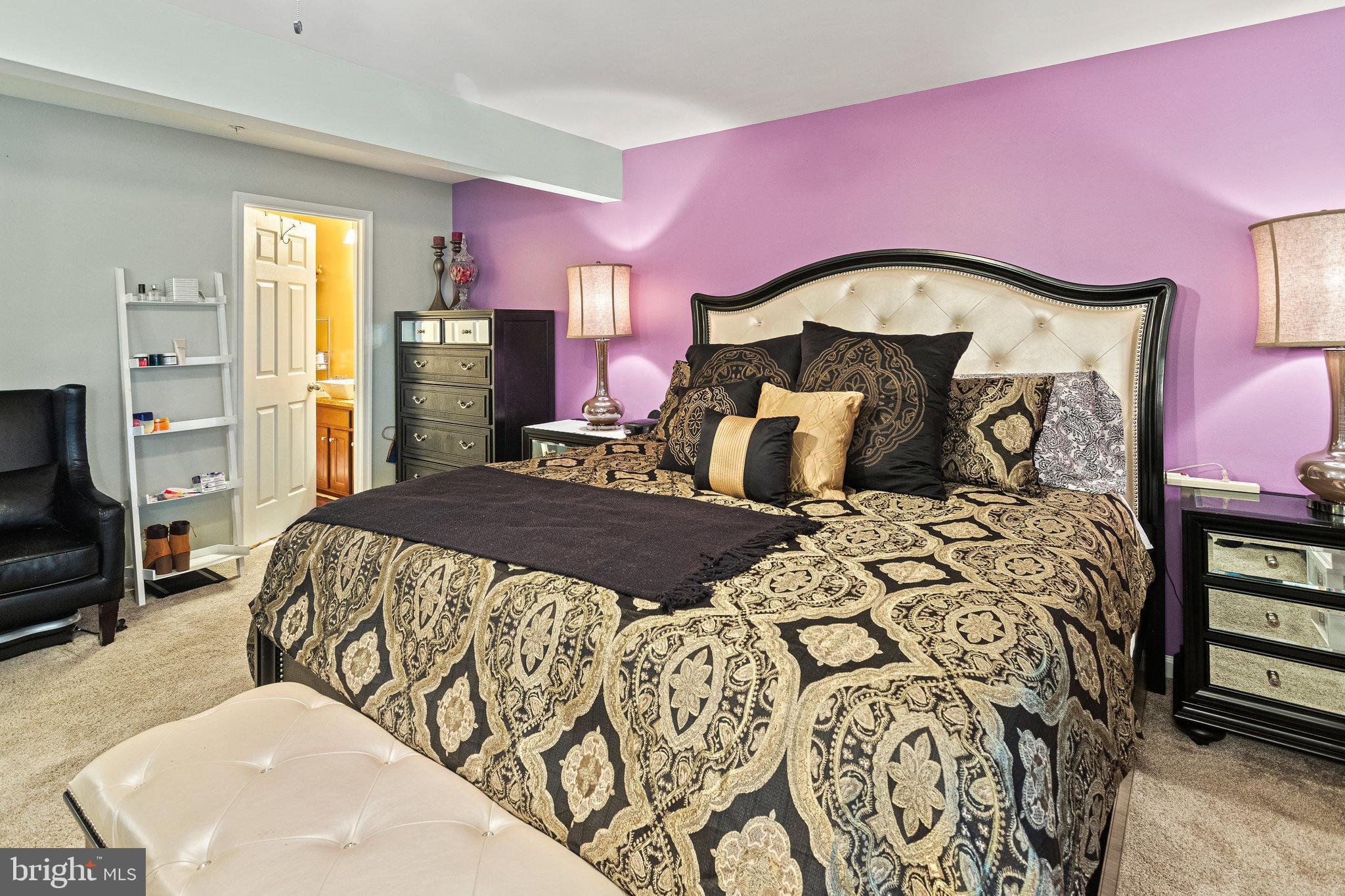 3445 Eagle Ridge Drive Woodbridge, VA 22191 - Photo 30 of 39 a bedroom with a bed and a mirror