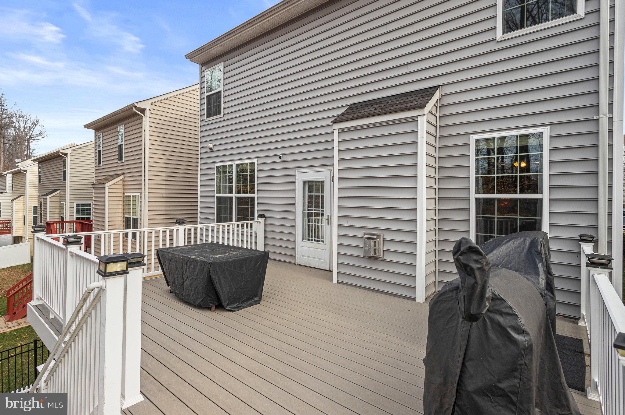 3445 Eagle Ridge Drive Woodbridge, VA 22191 - Photo 35 of 39 a view of balcony with couch and wooden floor