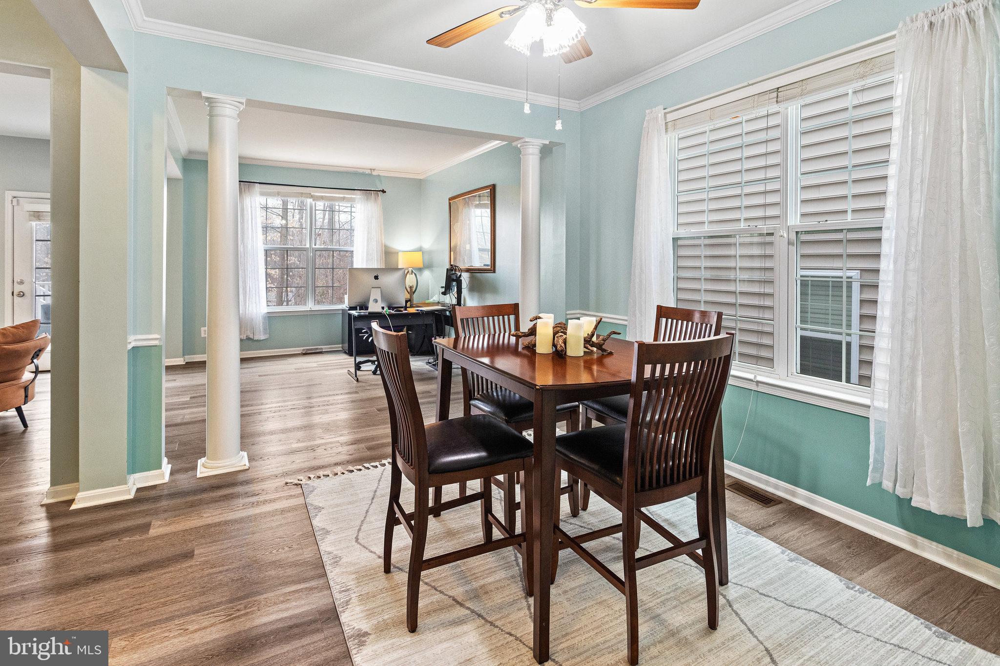 3445 Eagle Ridge Drive Woodbridge, VA 22191 - Photo 7 of 39 a view of a dining room with furniture and wooden floor