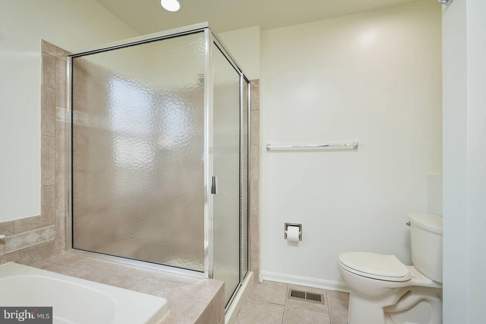 3506 Connor Place Frederick, MD 21704 - Photo 20 of 34 a bathroom with a shower and a toilet