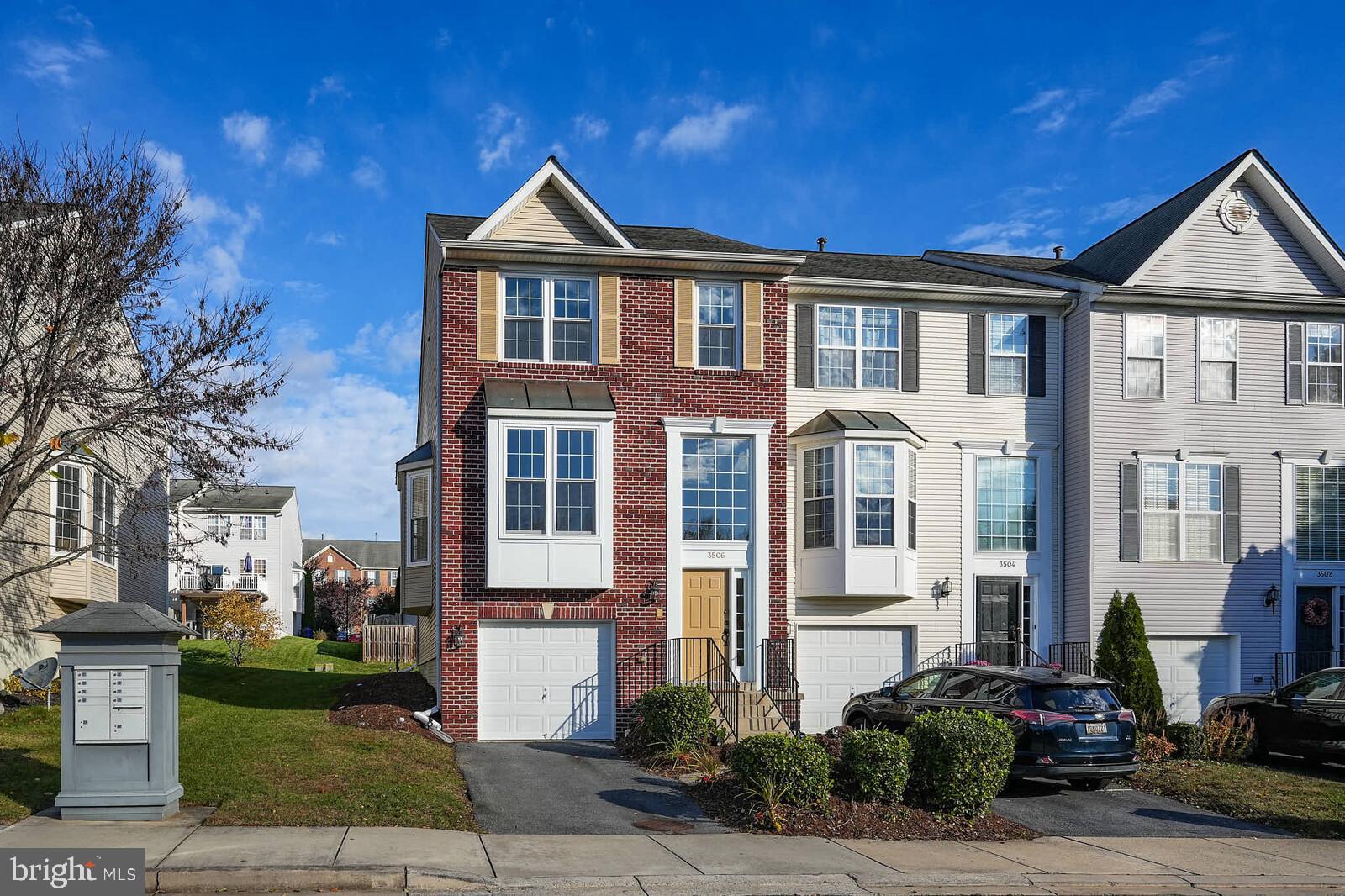 3506 Connor Place Frederick, MD 21704 - Photo 2 of 34 a front view of a residential apartment building with a yard