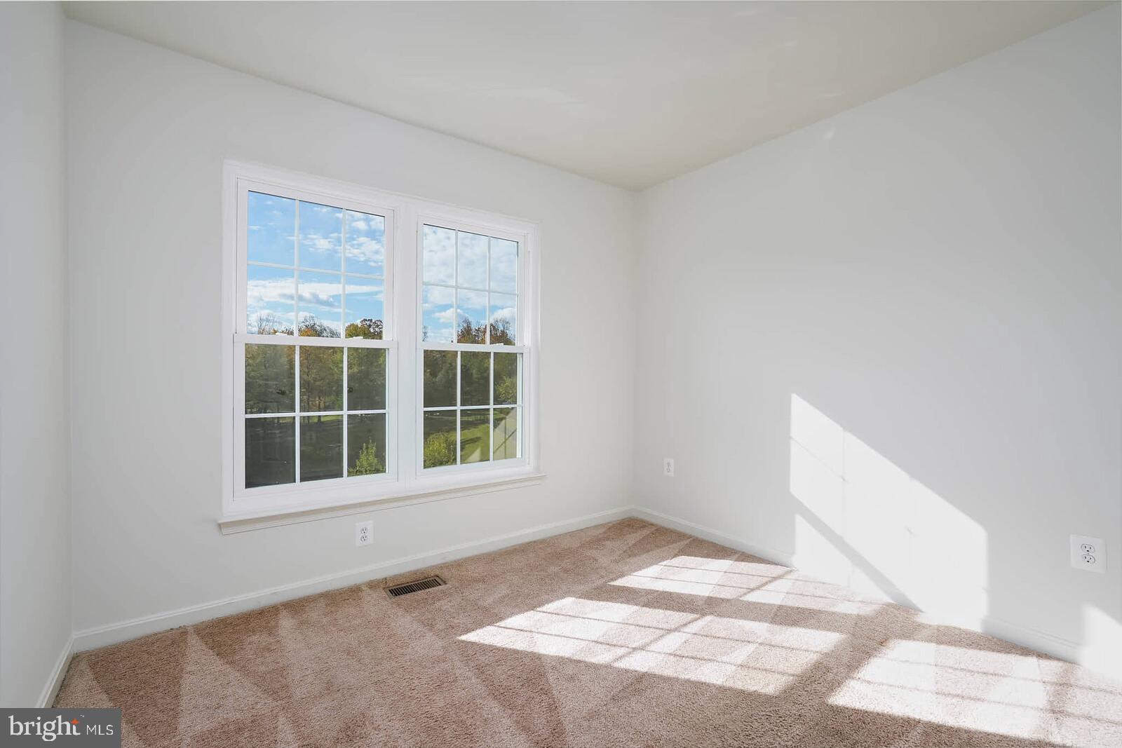 3506 Connor Place Frederick, MD 21704 - Photo 25 of 34 a view of an empty room with a window