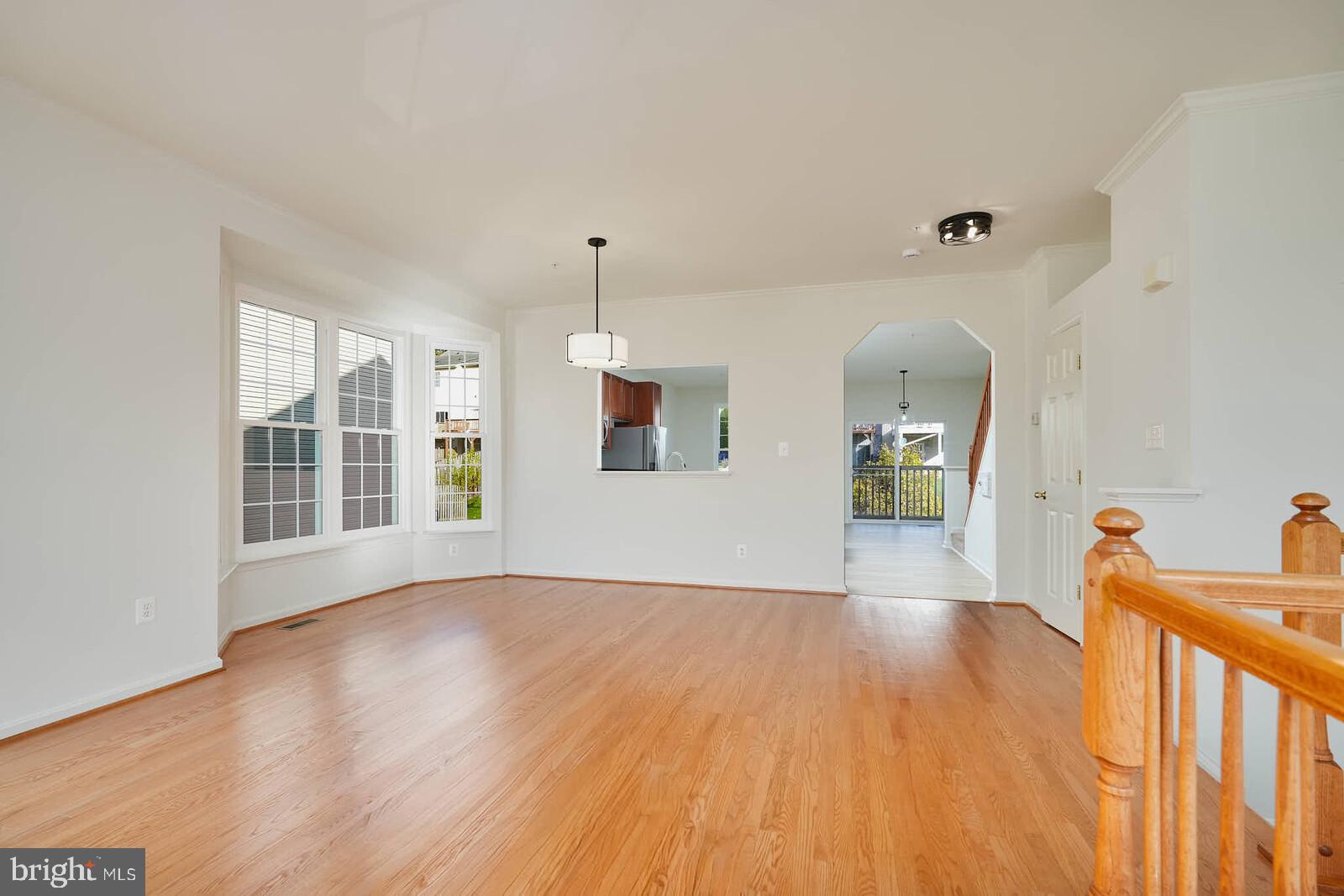 3506 Connor Place Frederick, MD 21704 - Photo 6 of 34 a view of livingroom with furniture wooden floor and windows