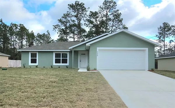 front view of house with a yard