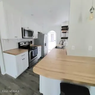 $1,800 | 208 Woody Hewett Avenue, Unit A, Carolina Beach, NC 28428