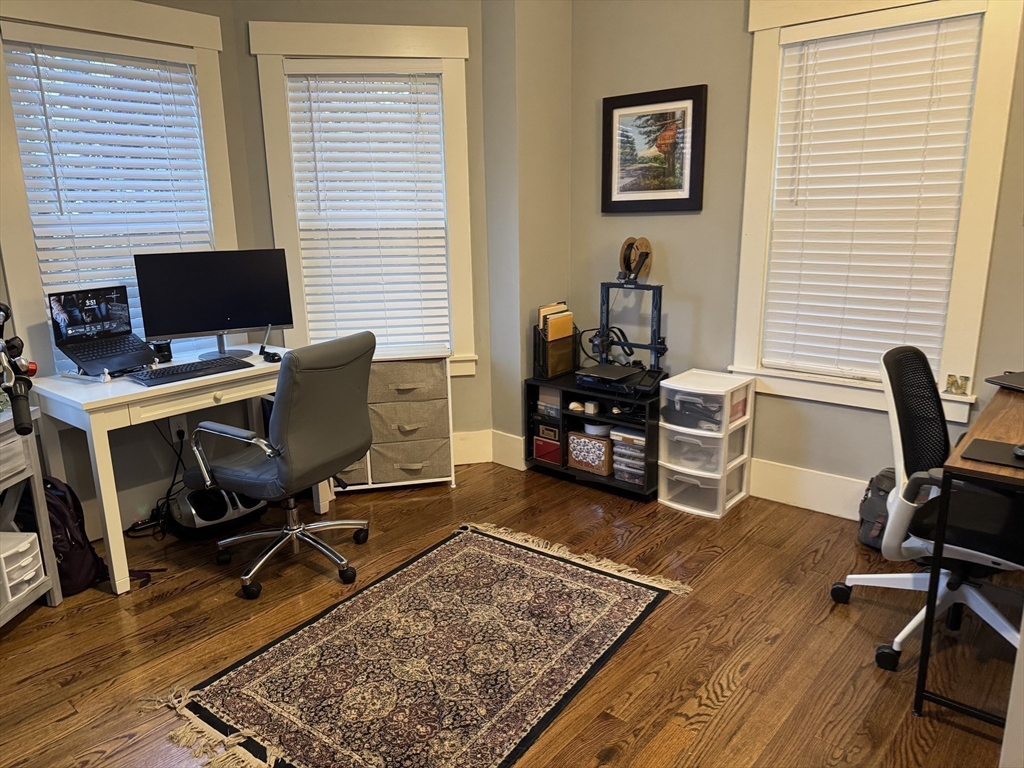 19 Macarthur Street, Unit 2 Somerville, MA 02145 - Photo 8 of 18 a view of a workspace with furniture and a window