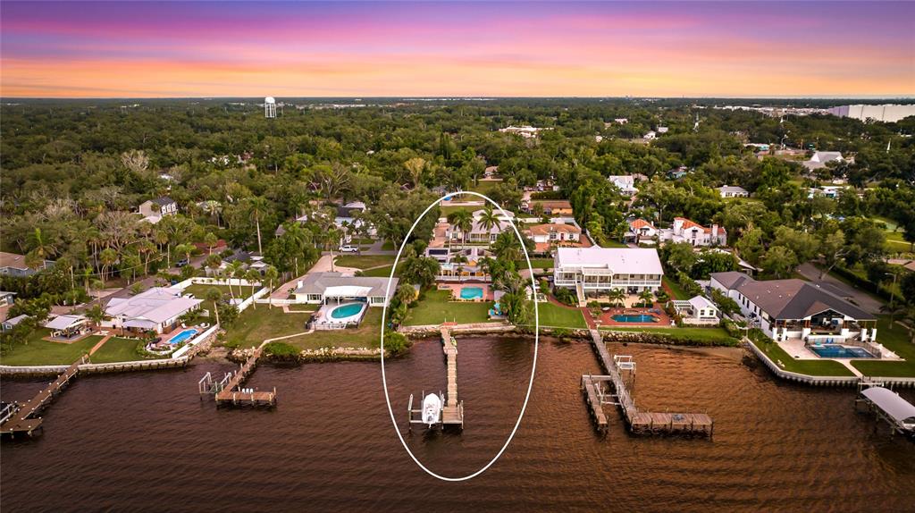 19007 Scallop Loop, Unit 204 Lakewood Ranch, FL 34211 - Photo 46 of 57 an aerial view of a city with lots of residential buildings ocean and mountain view in back