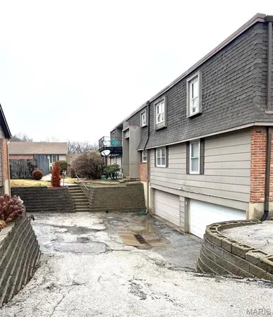 $69,000 | 6655 Blossomwood Drive, Unit B, Florissant, MO 63033