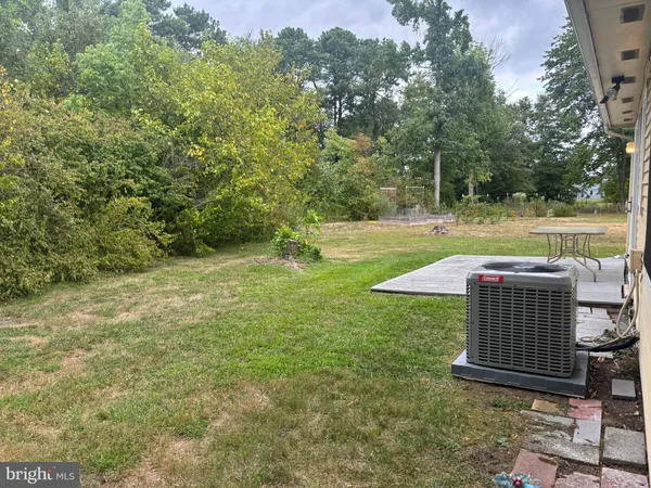 a front view of house with yard