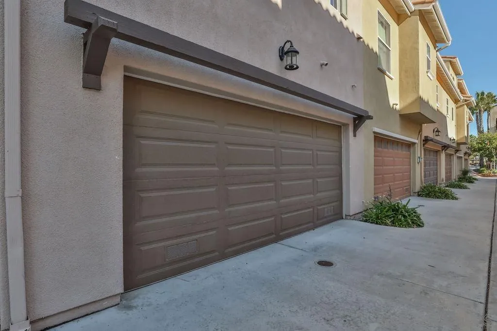 2297 Huntington Point Road, Unit 162 Chula Vista, CA 91914 - Photo 2 of 59 a view of a house with a wooden fence