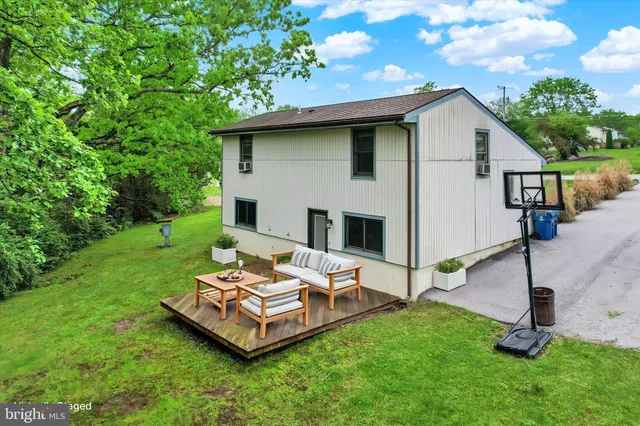 a backyard of a house with lots of green space