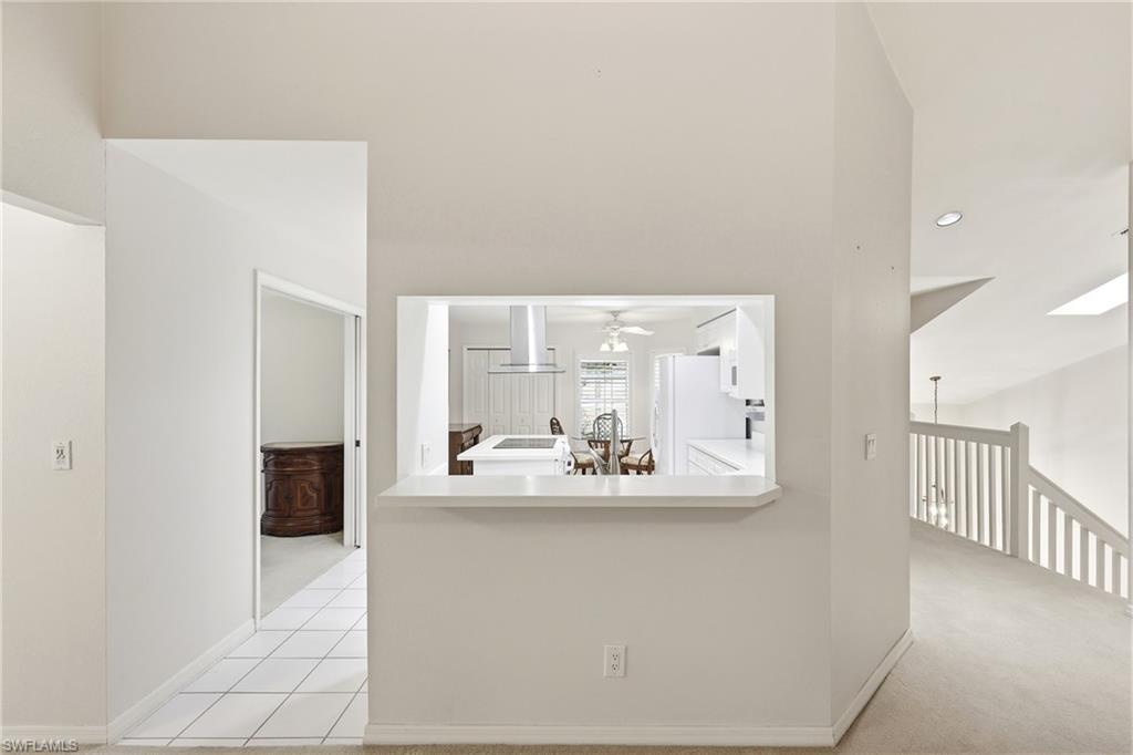 203 Via Perignon, Unit 24 Naples, FL 34119 - Photo 35 of 42 Add stools for a quick morning breakfast area