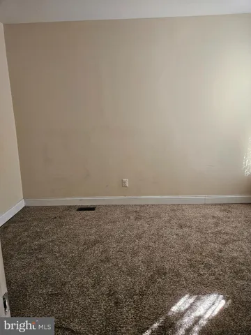 an empty room with closet