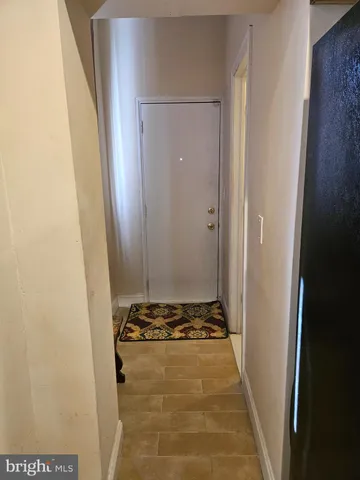 a bathroom with a tub and shower