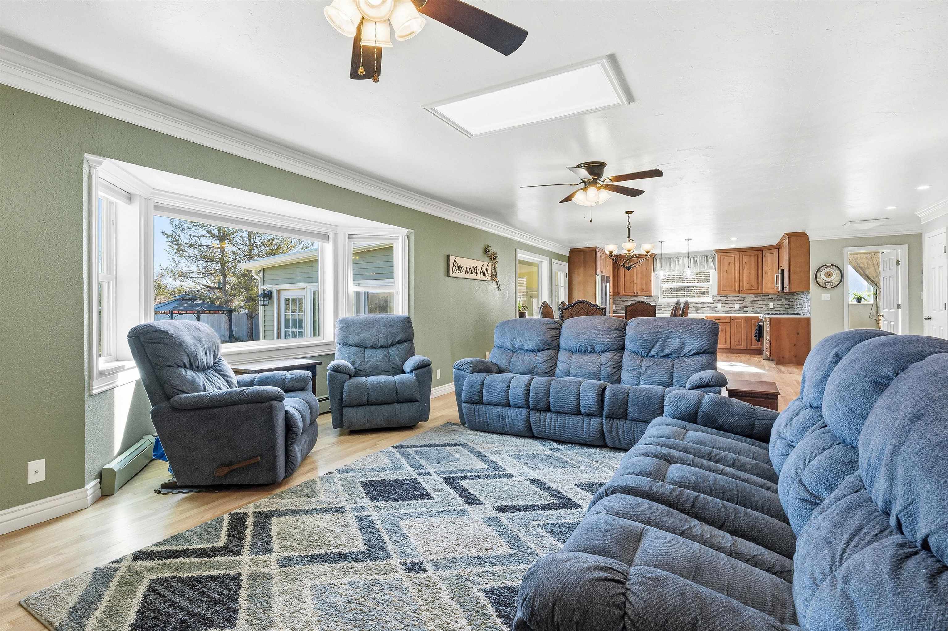 176-29 1/2 A 1/2 Road Grand Junction, CO 81503 - Photo 12 of 41 a living room with furniture and a large window