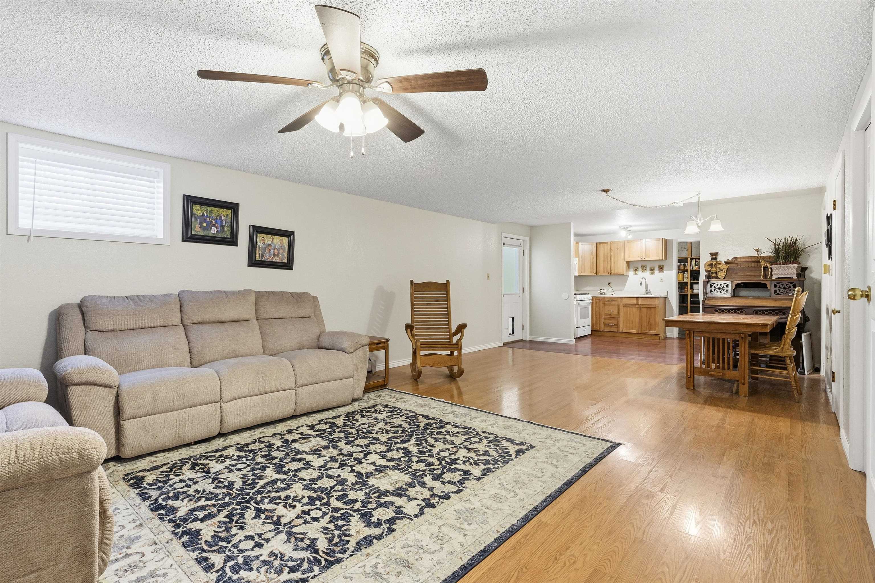 176-29 1/2 A 1/2 Road Grand Junction, CO 81503 - Photo 21 of 41 a living room with furniture and a wooden floor