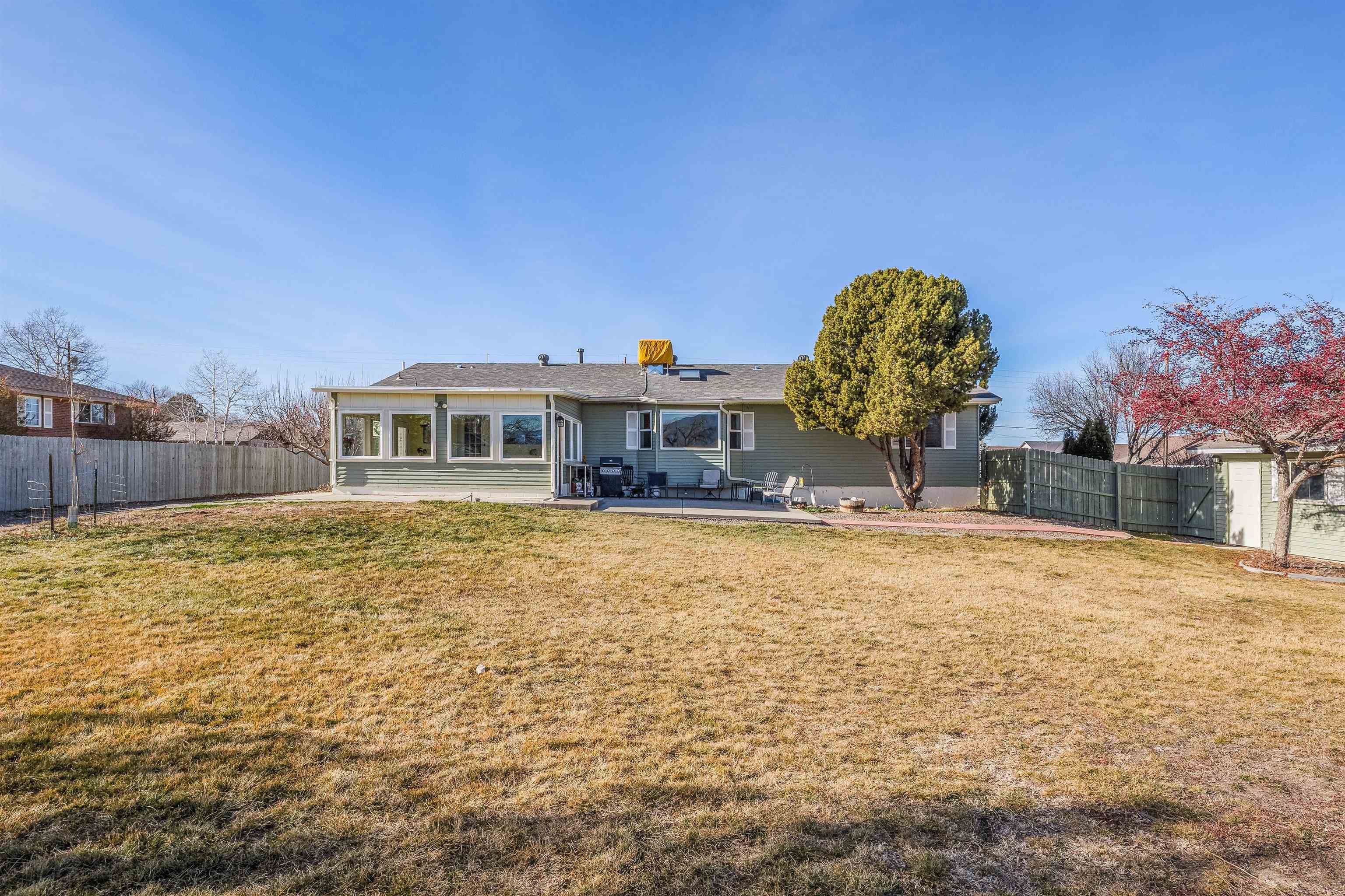 176-29 1/2 A 1/2 Road Grand Junction, CO 81503 - Photo 35 of 41 a front view of a house with a yard