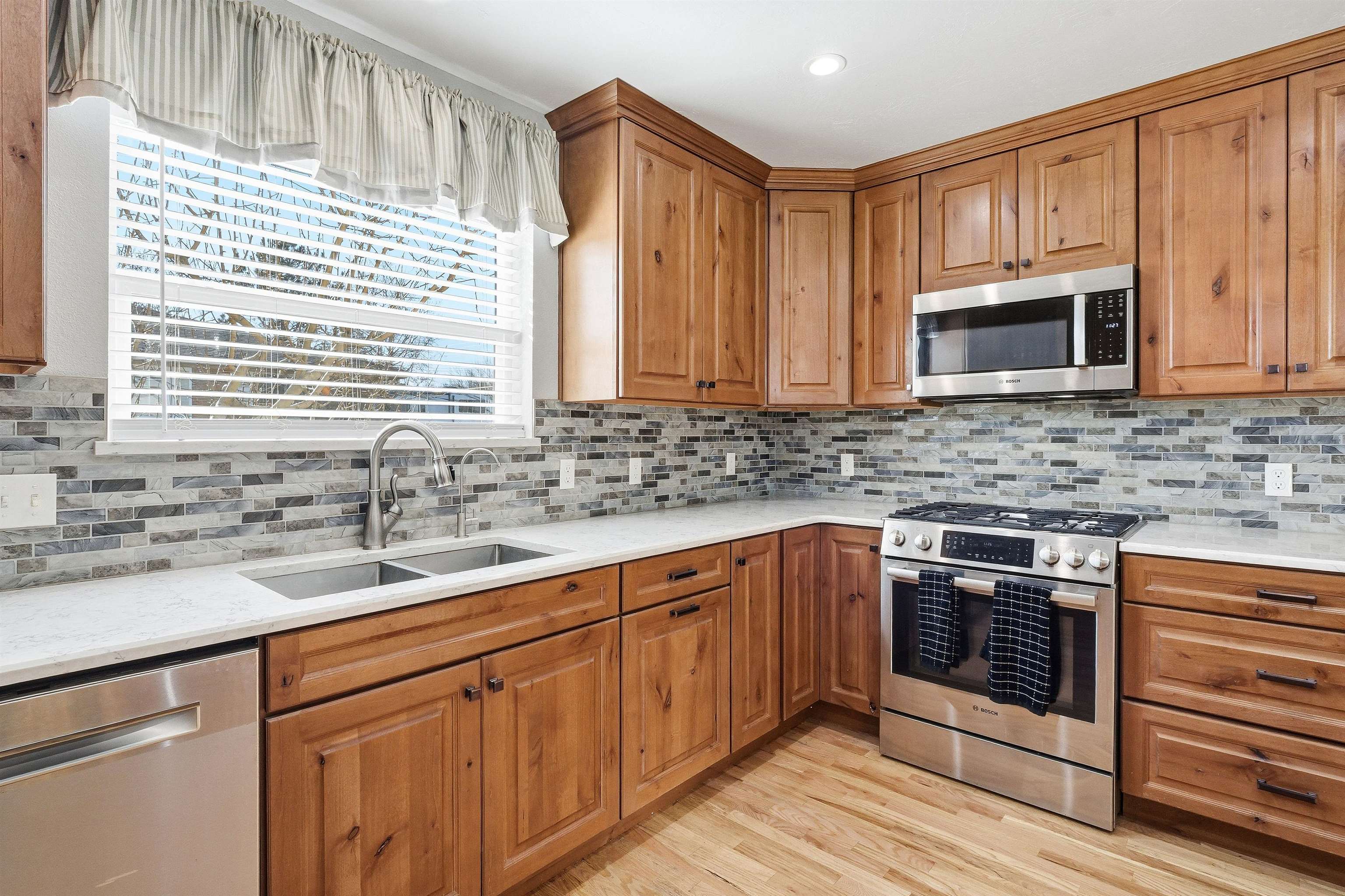 176-29 1/2 A 1/2 Road Grand Junction, CO 81503 - Photo 8 of 41 a kitchen with stainless steel appliances granite countertop a sink stove and cabinets