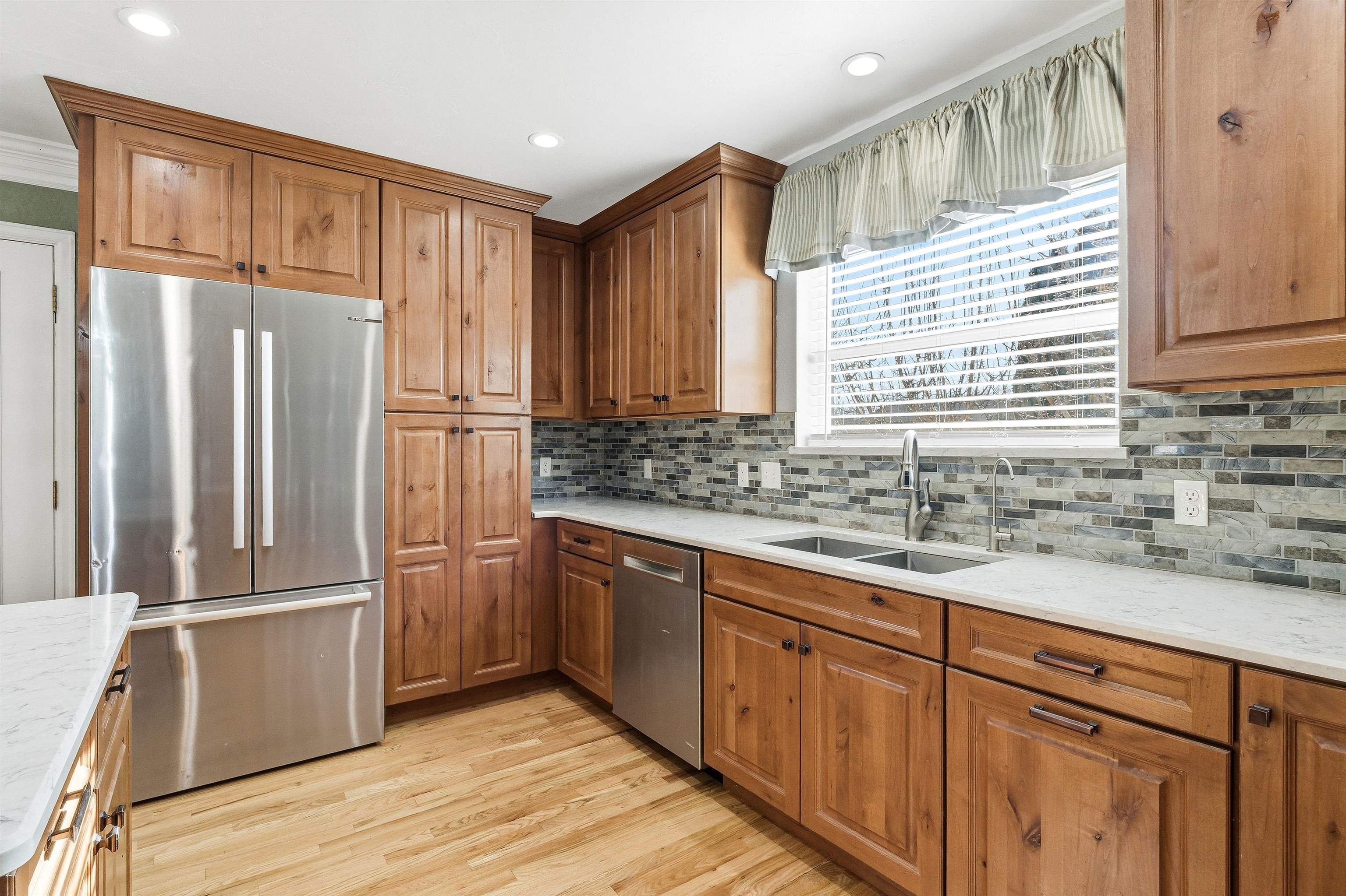 176-29 1/2 A 1/2 Road Grand Junction, CO 81503 - Photo 9 of 41 a kitchen with stainless steel appliances granite countertop a refrigerator and a sink