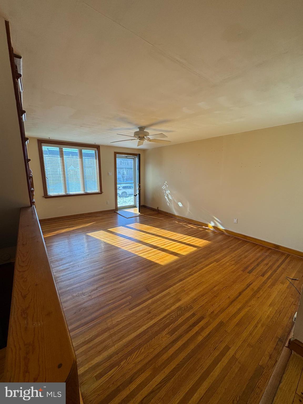 251 Revere Road Clifton Heights, PA 19018 - Photo 8 of 23 a view of an empty room with wooden floor and a window