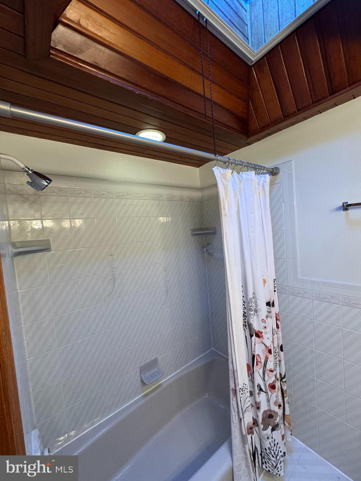 251 Revere Road Clifton Heights, PA 19018 - Photo 10 of 23 a bathroom with a shower curtain and a sink