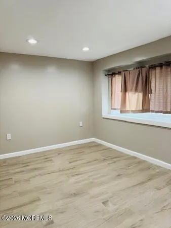 a view of a door and chair in a room