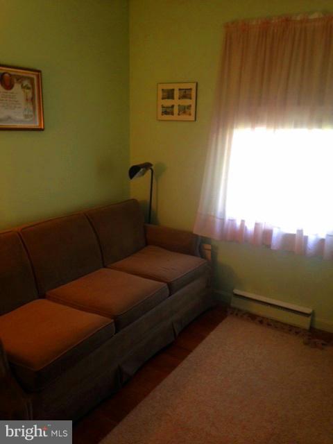 5435 Whitfield Chapel Road Lanham, MD 20706 - Photo 9 of 16 a living room with furniture and a window