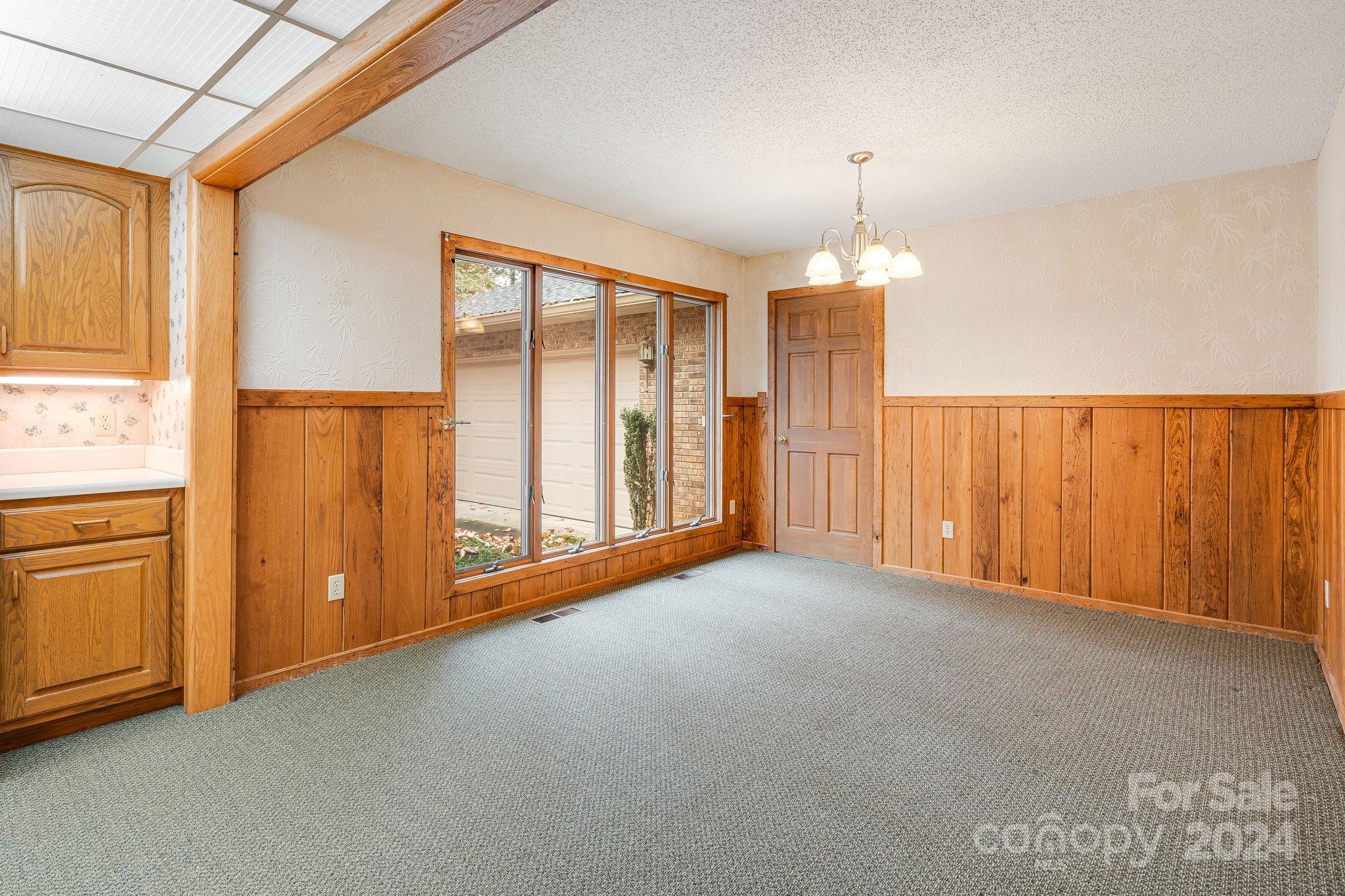 56 Whitaker View Road Fairview, NC 28730 - Photo 11 of 34 a view of an empty room with a window