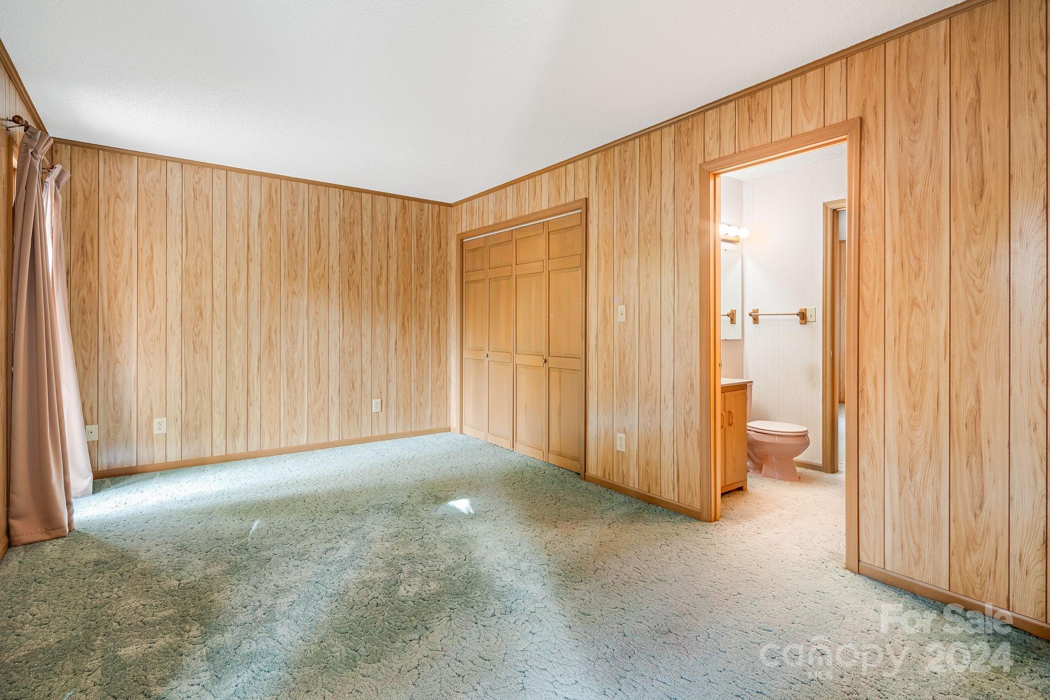 56 Whitaker View Road Fairview, NC 28730 - Photo 17 of 34 a view of empty room with wooden walls