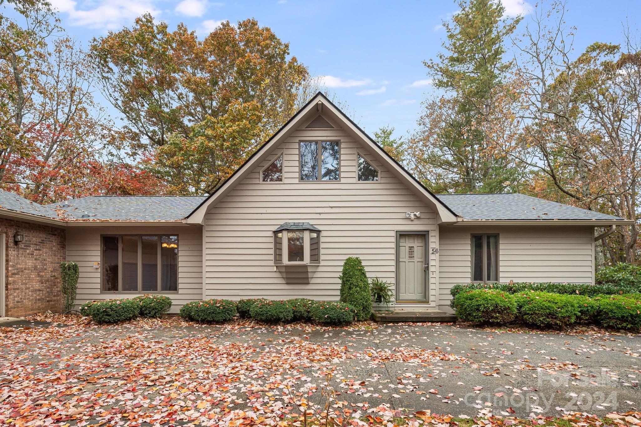 56 Whitaker View Road Fairview, NC 28730 - Photo 2 of 34 a view of a house with a yard